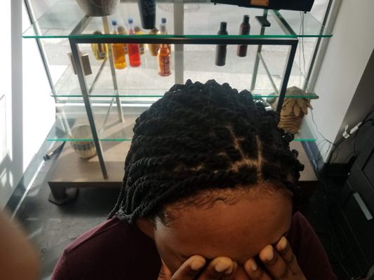 Braids and natural hair styling at Frank's Barber & Beauty Salon